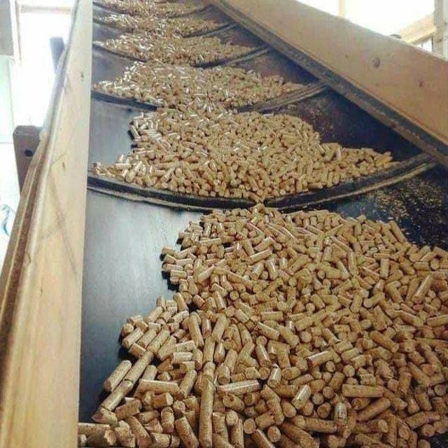 Acacia wood pellet bags stacked closely for wholesale shipment