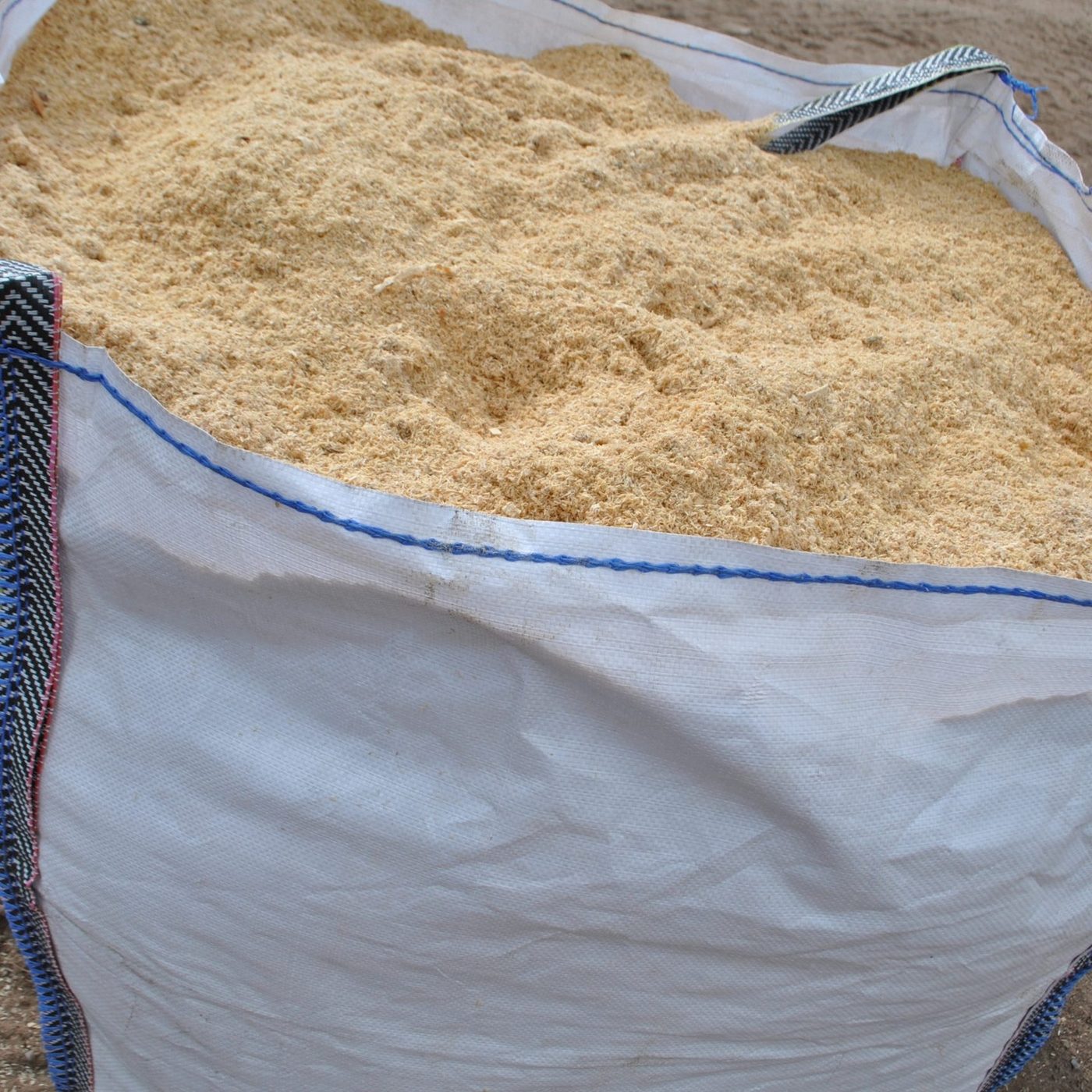 Fine sawdust in big bag, wood processing residue for bulk supply