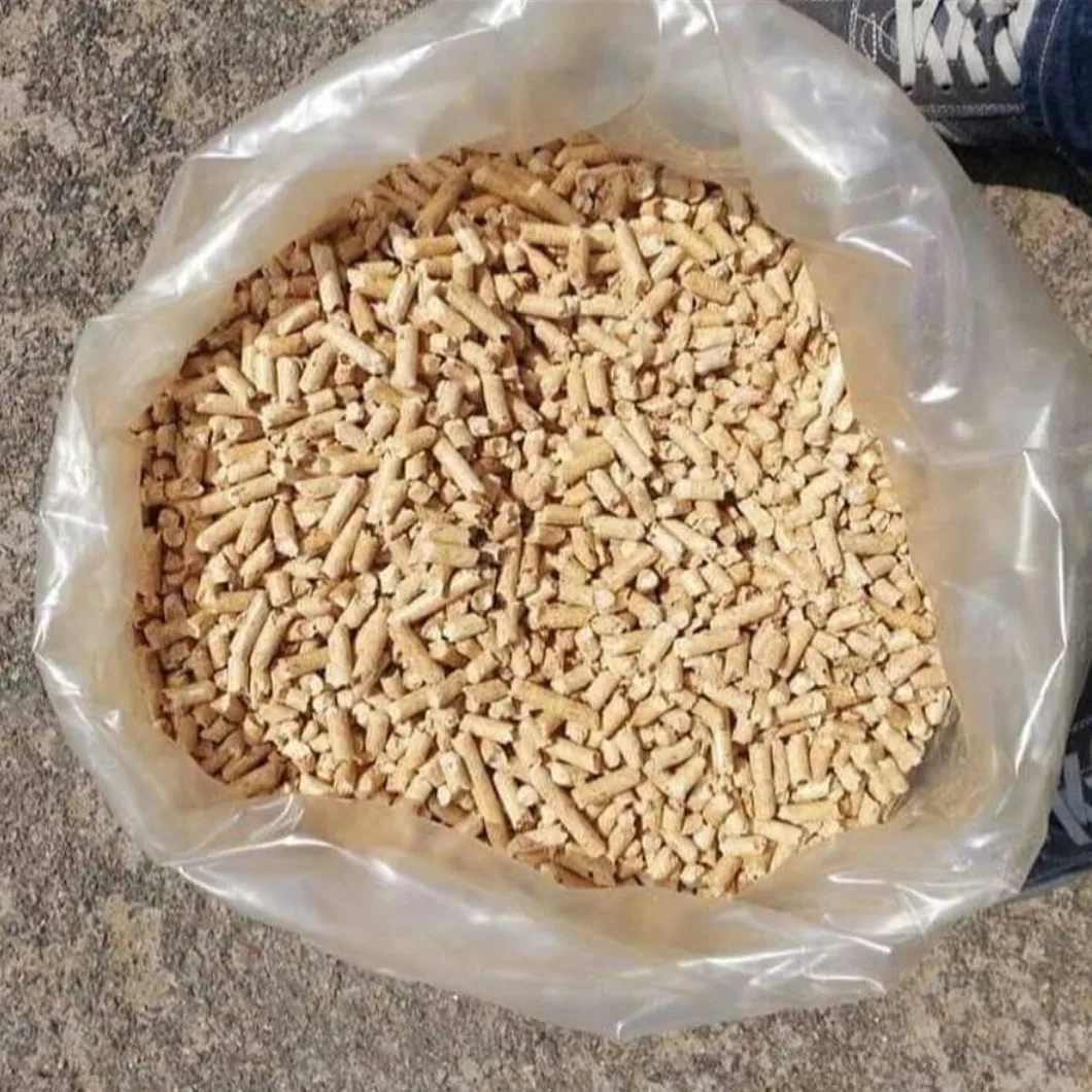Bag of spruce wood pellets opened outdoors showing pellet texture